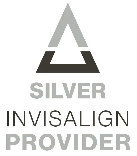 The image features a logo with the text SILVER INVISALIGN PROVIDER above a stylized triangle, which appears to be a branding symbol.