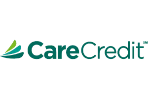 The image displays a logo with text that reads CareCredit accompanied by a stylized graphic element resembling a leaf or a small tree.